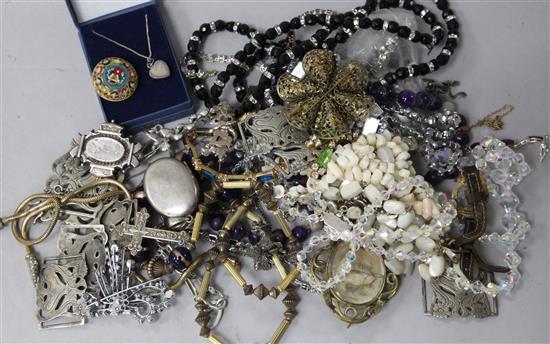 A quantity of mixed costume jewellery including silver brooch and a mourning brooch.